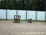 Color photo of recreation of tabernacle, view of wooden stock for holding animals for burnt offerings from 'Great Passion Play' copyright Elna M. Smith Foundation.